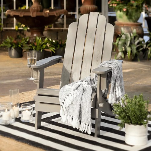 Adirondack chair with throw blanket