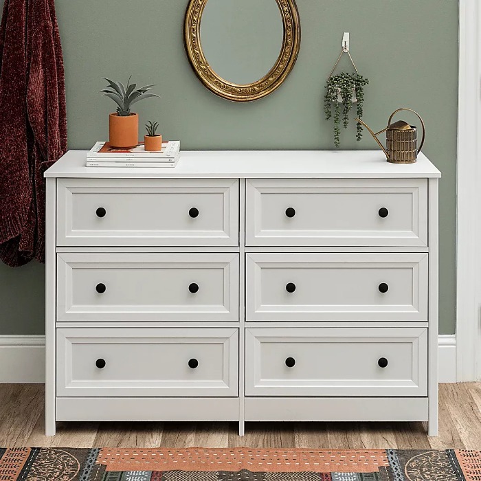 Mix up your dresser accents to make the most of your transitional furnishings.