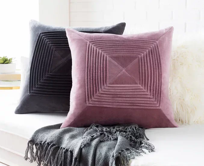 Patterned velvet throw pillows bring color, style and comfort to your seating sets.